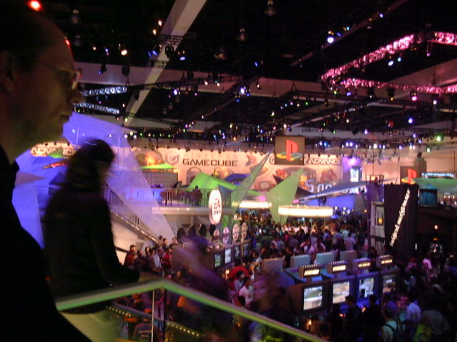 Aerial view from the upper level — GameCube and PlayStation logos in clear view below.