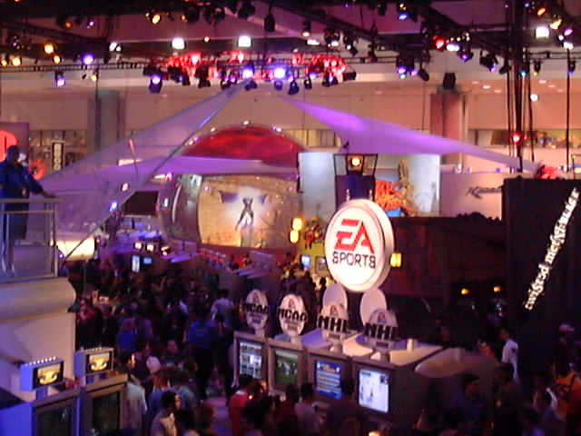 The EA Sports booth and its unmistakable circular logo — NHL, Madden, and more all under one massive roof.