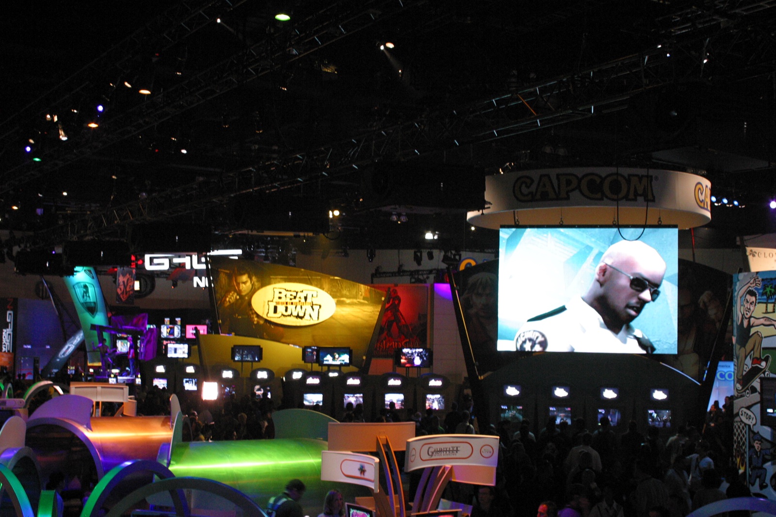 The show floor from above — Capcom, G4, and Final Fight: Streetwise visible among the booths.