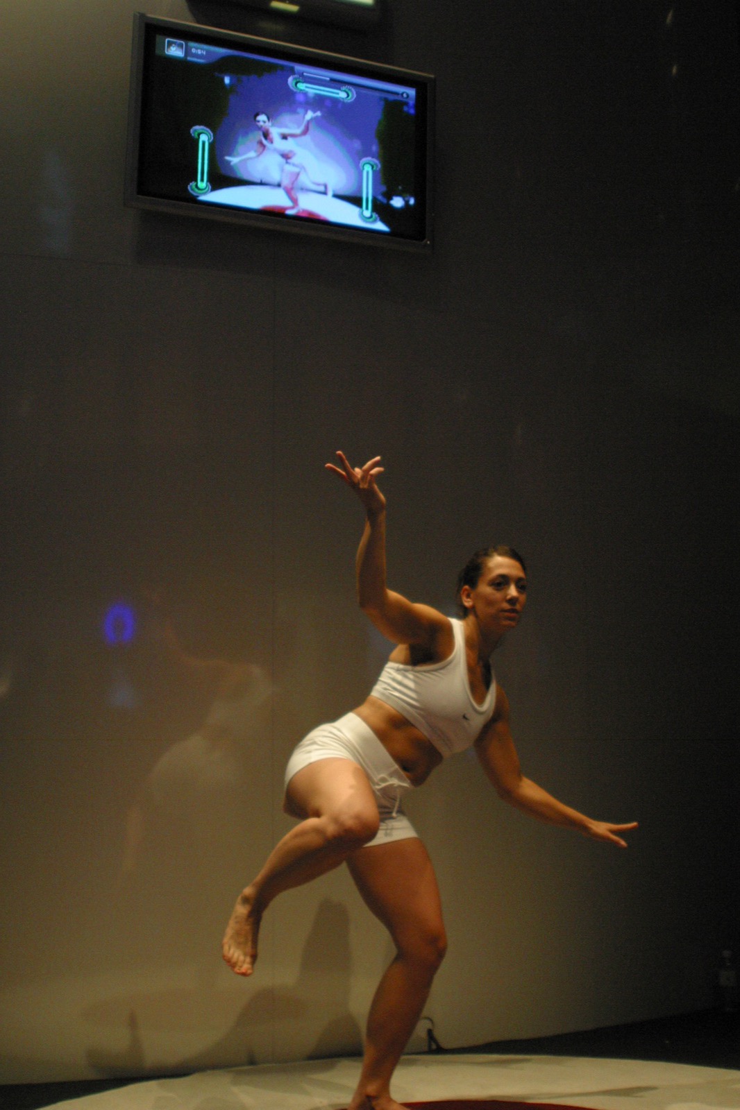 A dancer in mid-leap during the EyeToy: Kinetic live demo — the motion tracking captured every move.